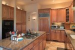 The kitchen is fabulously appointed with modern appliances and amenities
